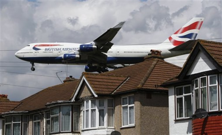 A British Airways passenger jet comes in for a landing at London's Heathrow Airport on Monday. A British court ruling stopped a planned strike just hours before it was due to begin.